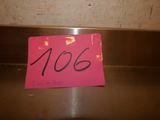 a pink sign with the number 1006 on it