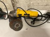 a yellow and black power tool sitting on top of a sink
