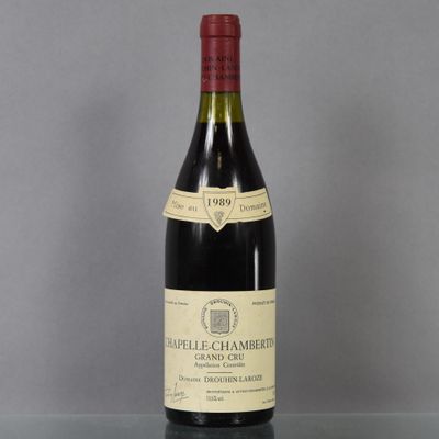 a bottle of wine that is sitting on a table