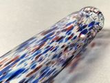 a close up of a glass object on a table
