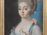 tableau représentant une jeune fille tenant un oiseau dans la main