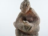 statue of a woman holding a baby in her arms