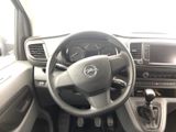 a steering wheel and dashboard of a small car