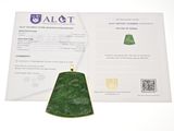 a picture of a green stone pendant on a card