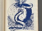an open book with a drawing of an apple on it