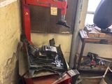an image of a garage with a work bench and tools