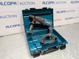 a close up of a tool in a blue case on a table
