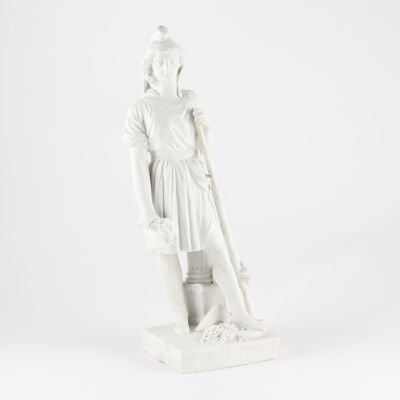 white statue of a woman with a cane and a hat on a white background