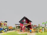 une petite maquette de ferme avec un tracteur et des animaux de la ferme