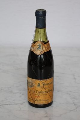 a bottle of wine that is sitting on a table