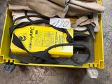 a yellow tool box with gloves, gloves and a pair of scissors