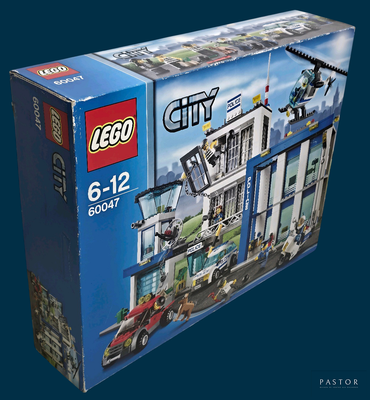 a box with a lego city set inside of it