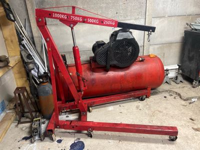 Chèvre de levage hydraulique rouge sur roues, capacité de 25… - Photo 1