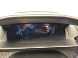 the dashboard of a car with a digital display in the center