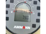 a close up of a digital clock on a table