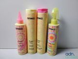 three different types of hair products sitting on top of a table