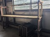 a metal shelf with a shelf on top of it