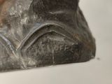 an image of a close up of a statue of a cat