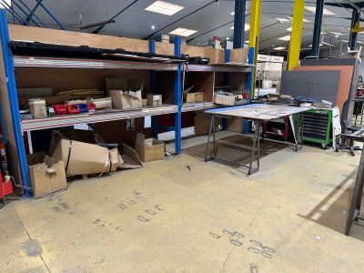 a room filled with lots of boxes and shelves