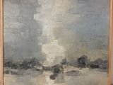 une image représentant un tableau représentant un paysage, dans un cadre en bois