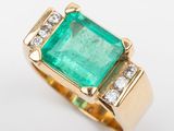 an emerald and diamond ring