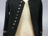 an image of a black jacket with gold buttons on a mannequin dummy