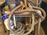 an image of a welding station with a lot of equipment