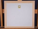 a picture of an easel with a painting on it