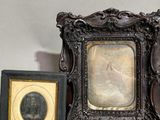 a picture of a picture of a man and a picture of a woman in a picture frame