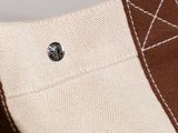 canvas tote bag with brown stitching detail