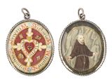 an image of two pendants with a picture of a man holding a cross and a heart
