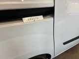 an image of a white van with a sticker on it