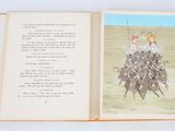 a picture of a book with a picture of a horse race