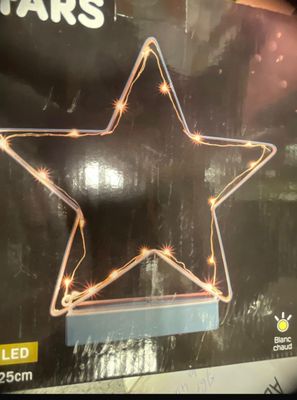 a box with a star shaped decoration on it