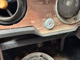 a close up of a car dashboard with a lot of rust on it