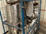 a metal rack with a bunch of metal pipes on it