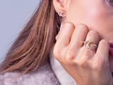 a woman with a ring on her finger and a ring on her finger