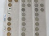 a lot of coins in a plastic bag on the table