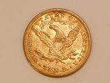 an image of a gold coin with a eagle on it