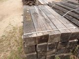many pieces of wood stacked on top of each other