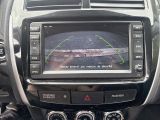 a picture of a car dashboard with a camera mounted on it