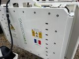 a machine that is sitting on the side of the road