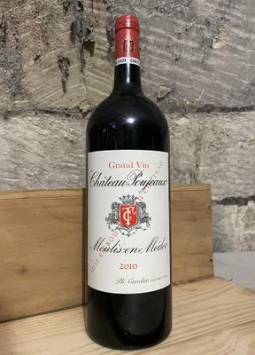 a bottle of wine that is sitting on a table