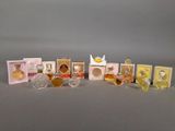 a lot of perfumes that are sitting on a table