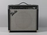 a close up of a fender guitar amplifier sitting on top of a table