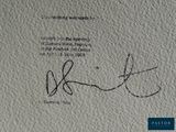a close up of a piece of paper with a handwriting on it