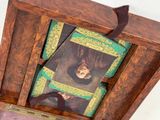 a picture of a picture of a man in a wooden box