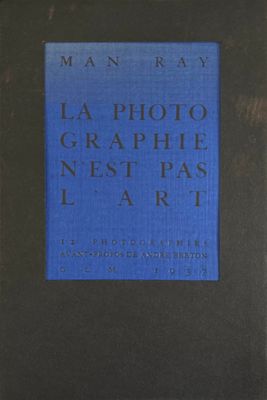 a black book with a blue cover and a black frame