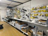 a room with a lot of items on the wall