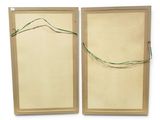 two wooden frames with a string attached to them